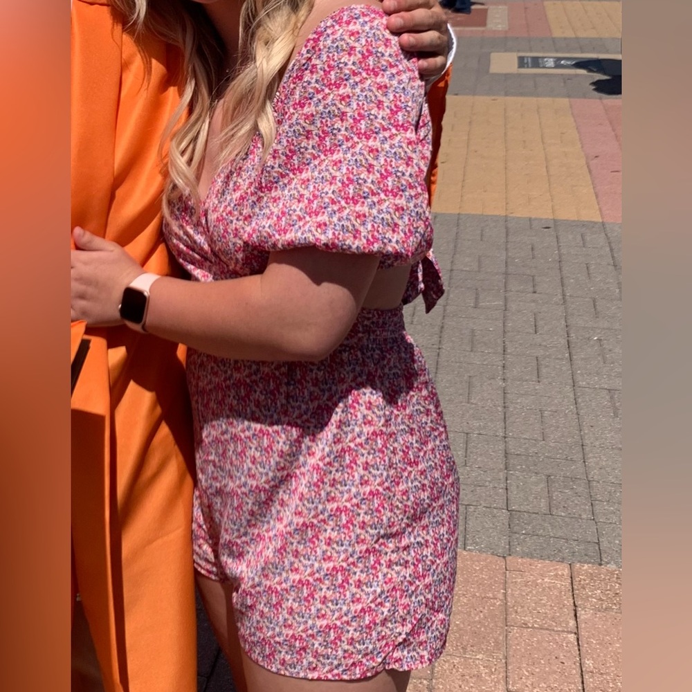 Floral romper with side cut outs